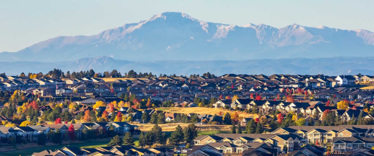 Colorado Living. Centennial, Colorado - Denver Metro Area Residential Autumn Panorama with the view of the Front Range mountains in the distance